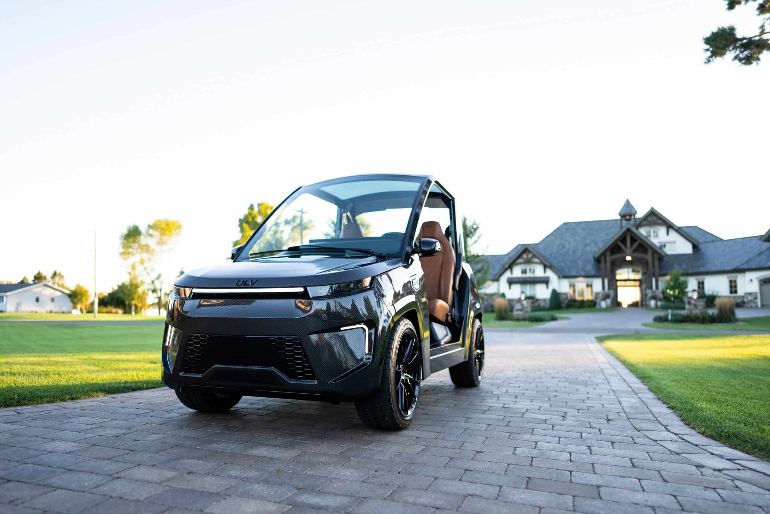 ULV 322 carbon in black viewed from the front while parked in driveway