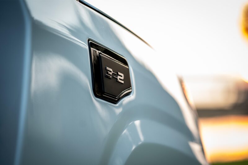 close up of the 322 logo on the side of a white ulv 322 model